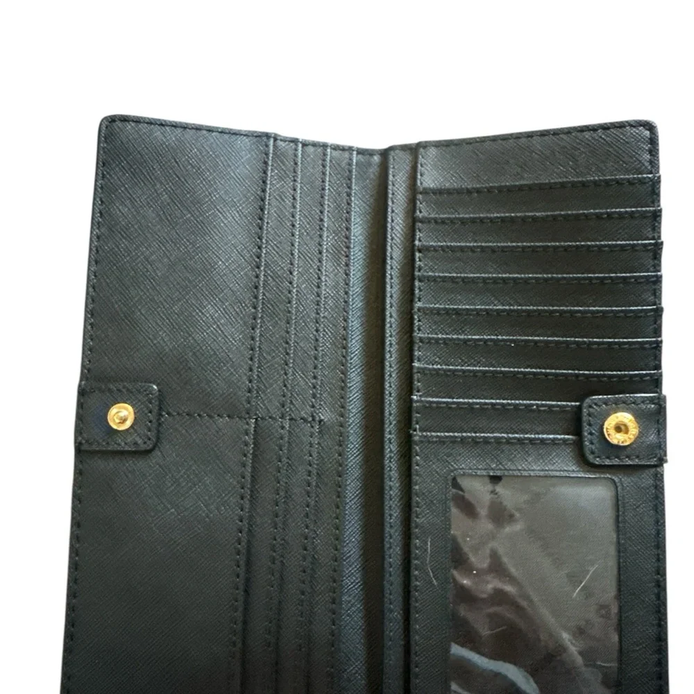 The Michael Kors Jet Set Travel Large Saffiano Leather wallet